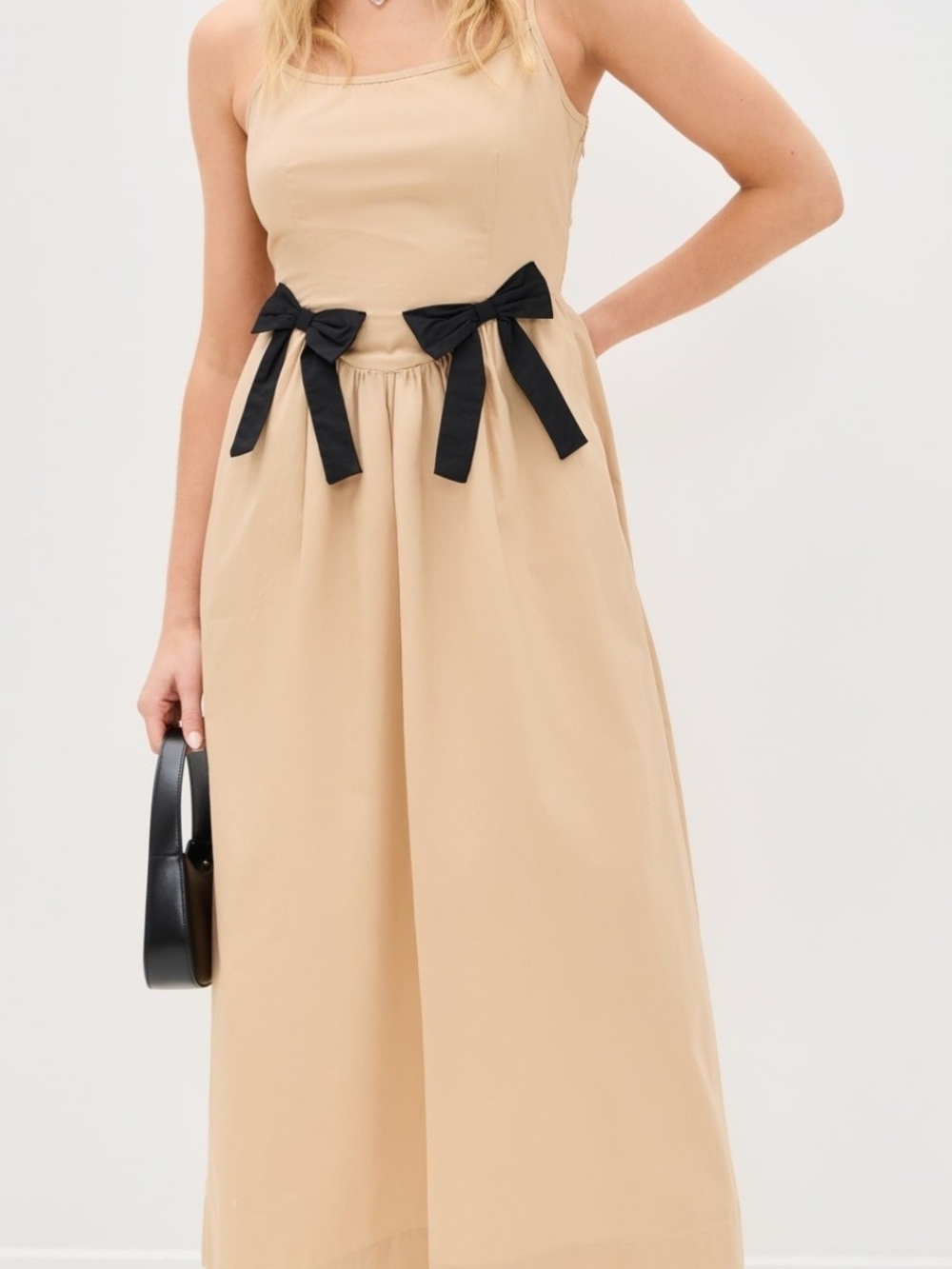 Moon River Beige Tank Jumpsuit with Black Bow Accents